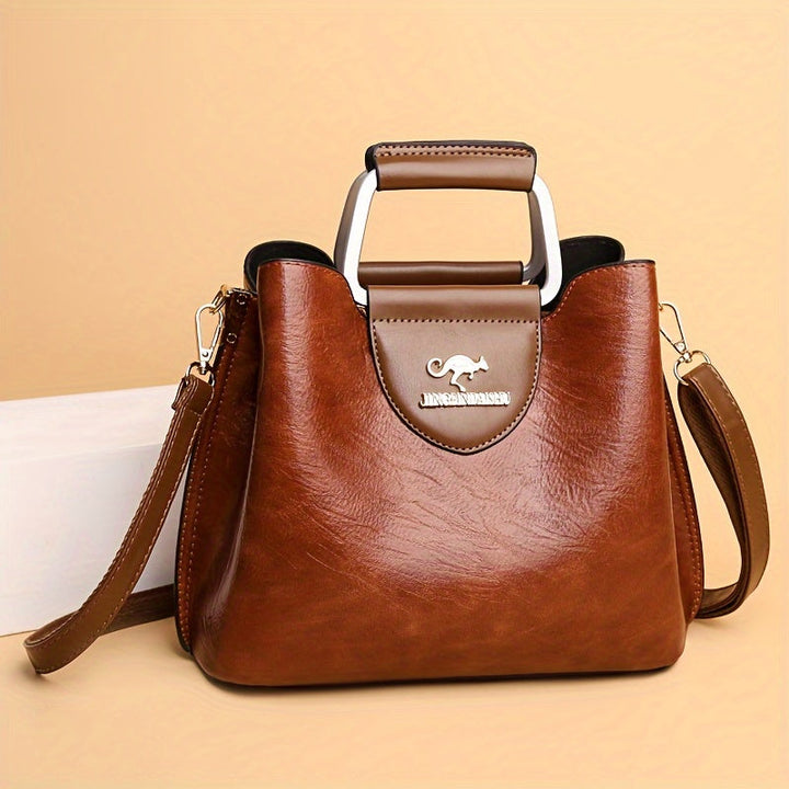 Ava | Elegante zweifarbige Ledertasche