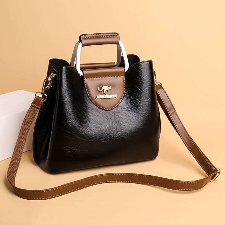 Ava | Elegante zweifarbige Ledertasche